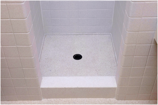 The existing tile surfaces have been completely refinished and the shower pan permanently sealed from leaks in just days and without any demolition or replacement of tile.
