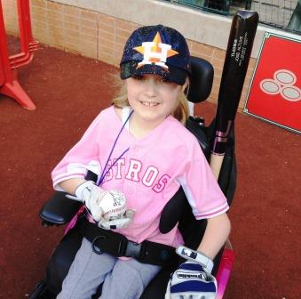 Reagan Imhoff throws out the first pitch at a Houston Astros game, courtesy of CITGO.