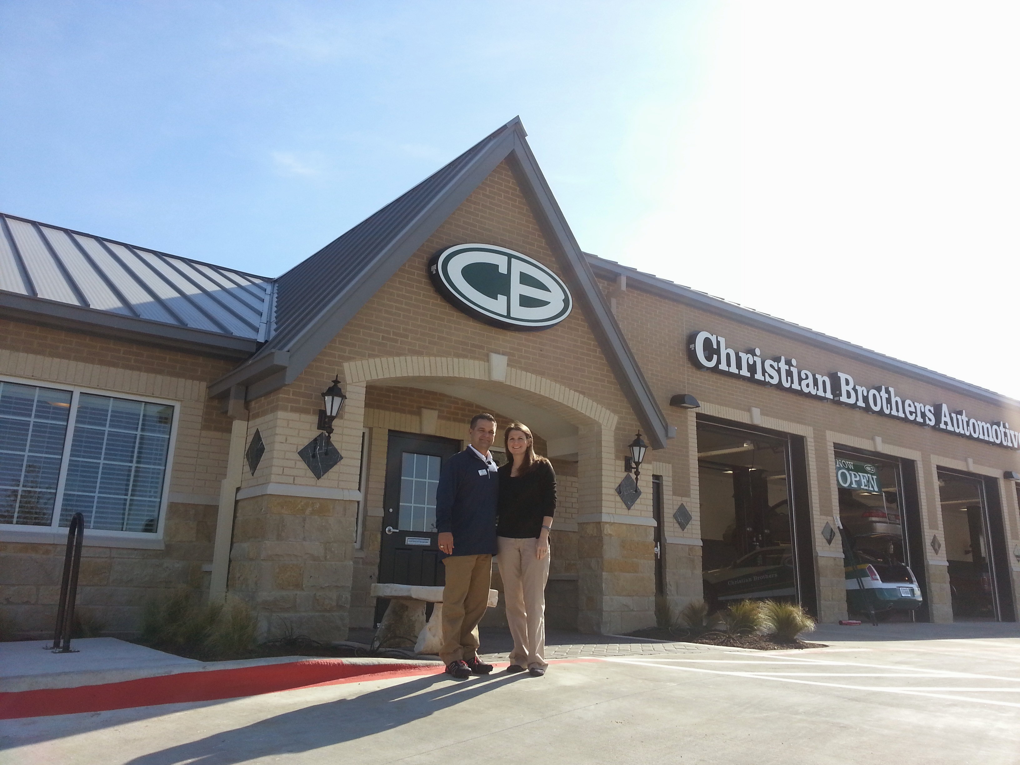 Jason and Colleen Gaudreau in front of their new location