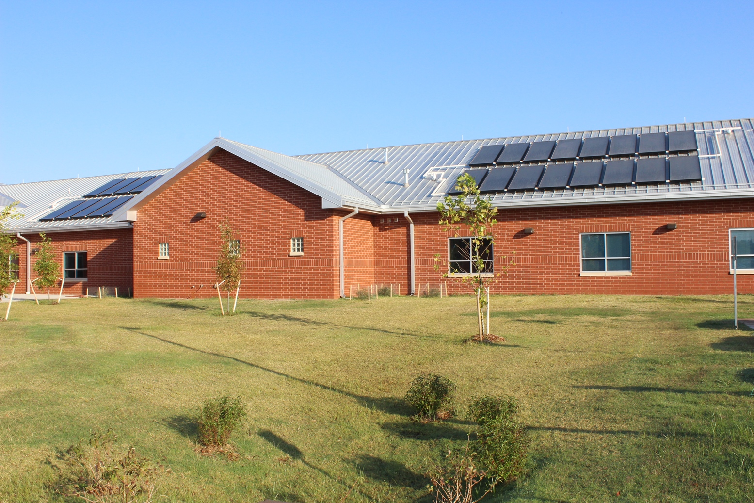 The LEED-certified dormitories feature energy-efficient solar panels to supply hot water to tenants.