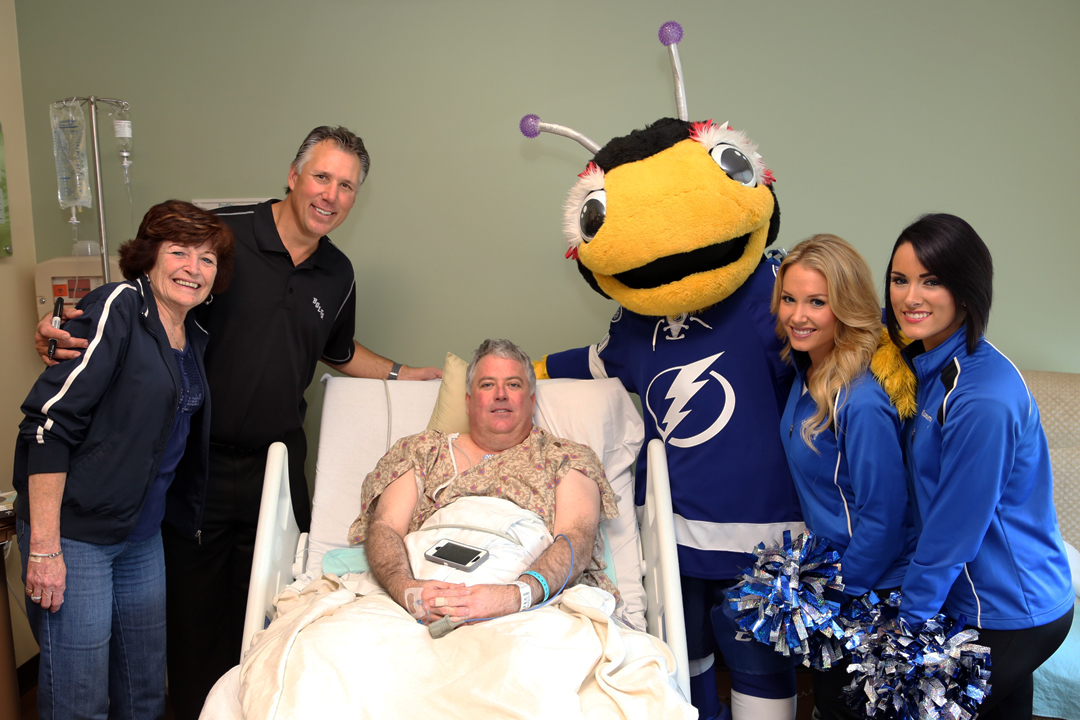 Tampa Bay Lightning's Vice President of Corporate and Community Affairs, Dave Andreychuk, visits patients at Florida Hospital Wesley Chapel