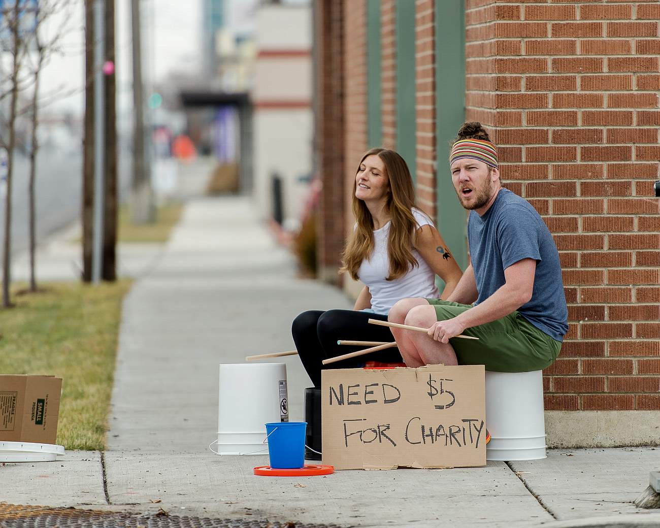 Earn $5 for charity playing the bucket drums