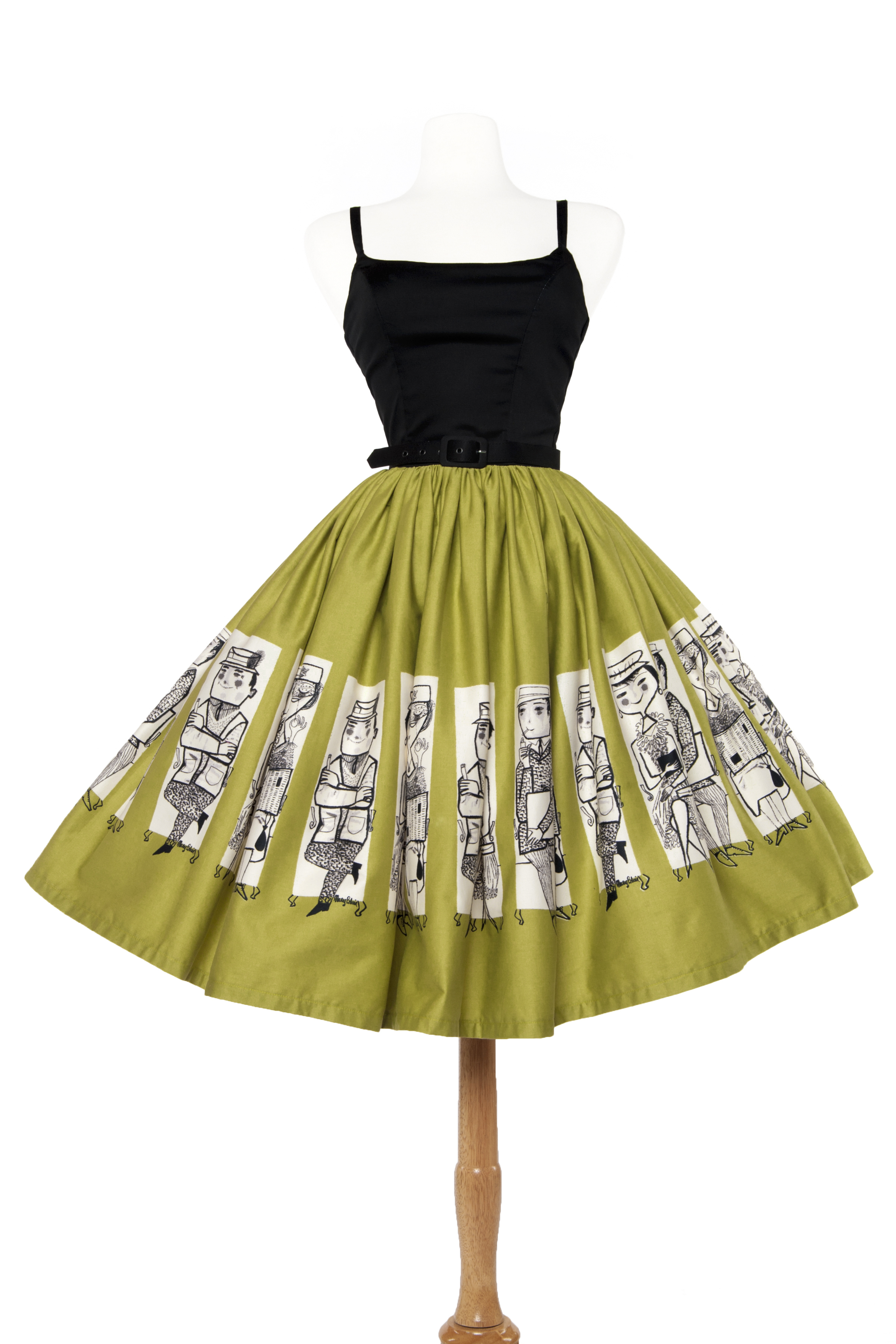 Inspired by an early 1960s day dress design, the Jenny Dress is a flirty sundress that has wonderful structure. Featuring the fun Commuters print from Mary Blair in olive, black, and white.
