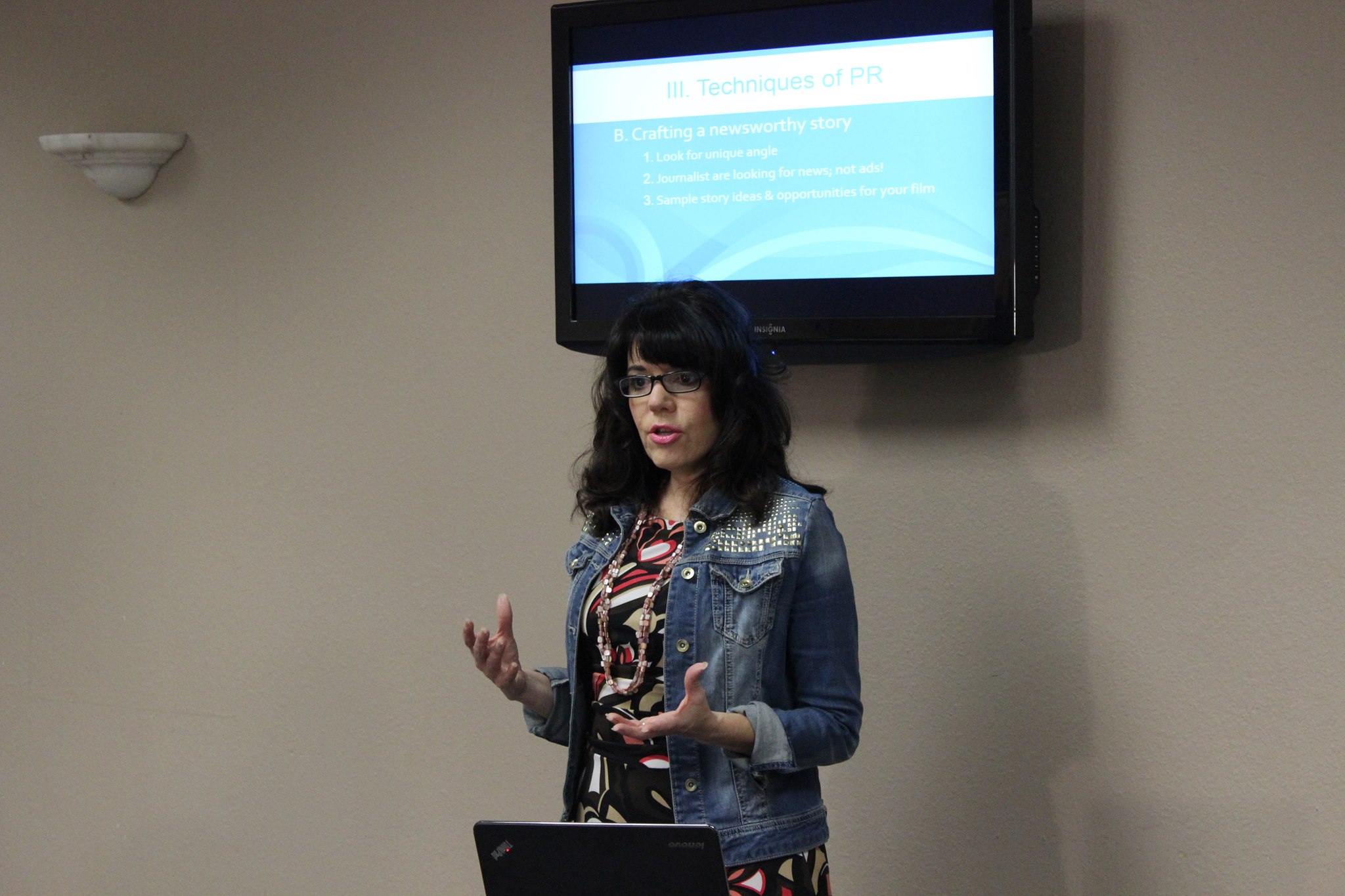 Cheryl Wicker teaching PR at a 2014 media conference