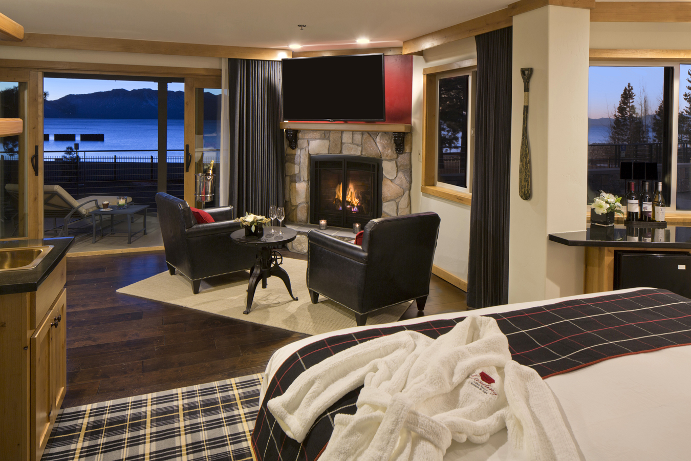 Stone fireplaces and leather chairs make every guest room at The Landing a delightful retreat.