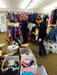 Clickstop employees sort through donations collected during the company's first Donation Drive for Clickstop Cares.
