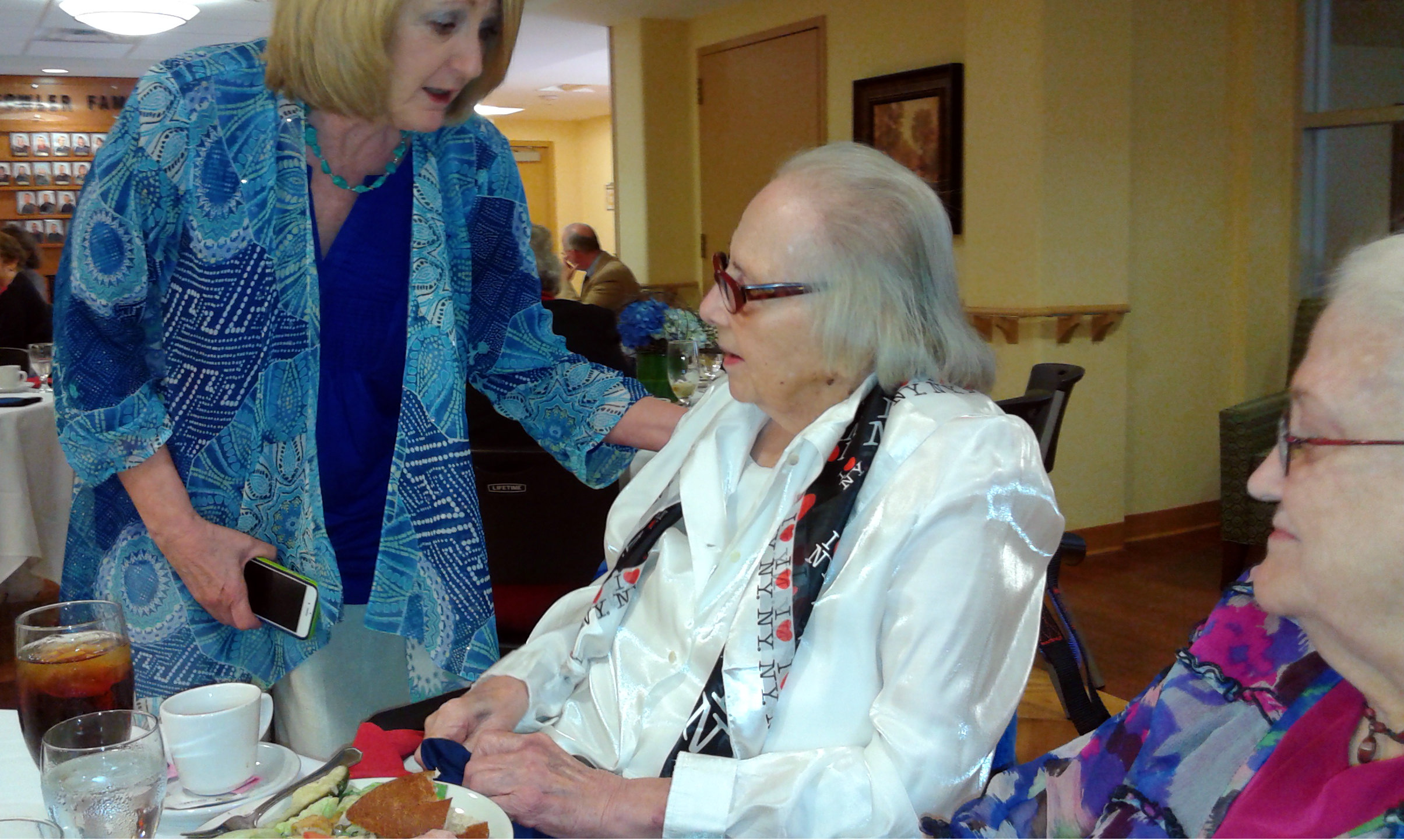 Missy Buchanan chats with retired art teacher Margaret Buchanan at the luncheon after the panel discussion.