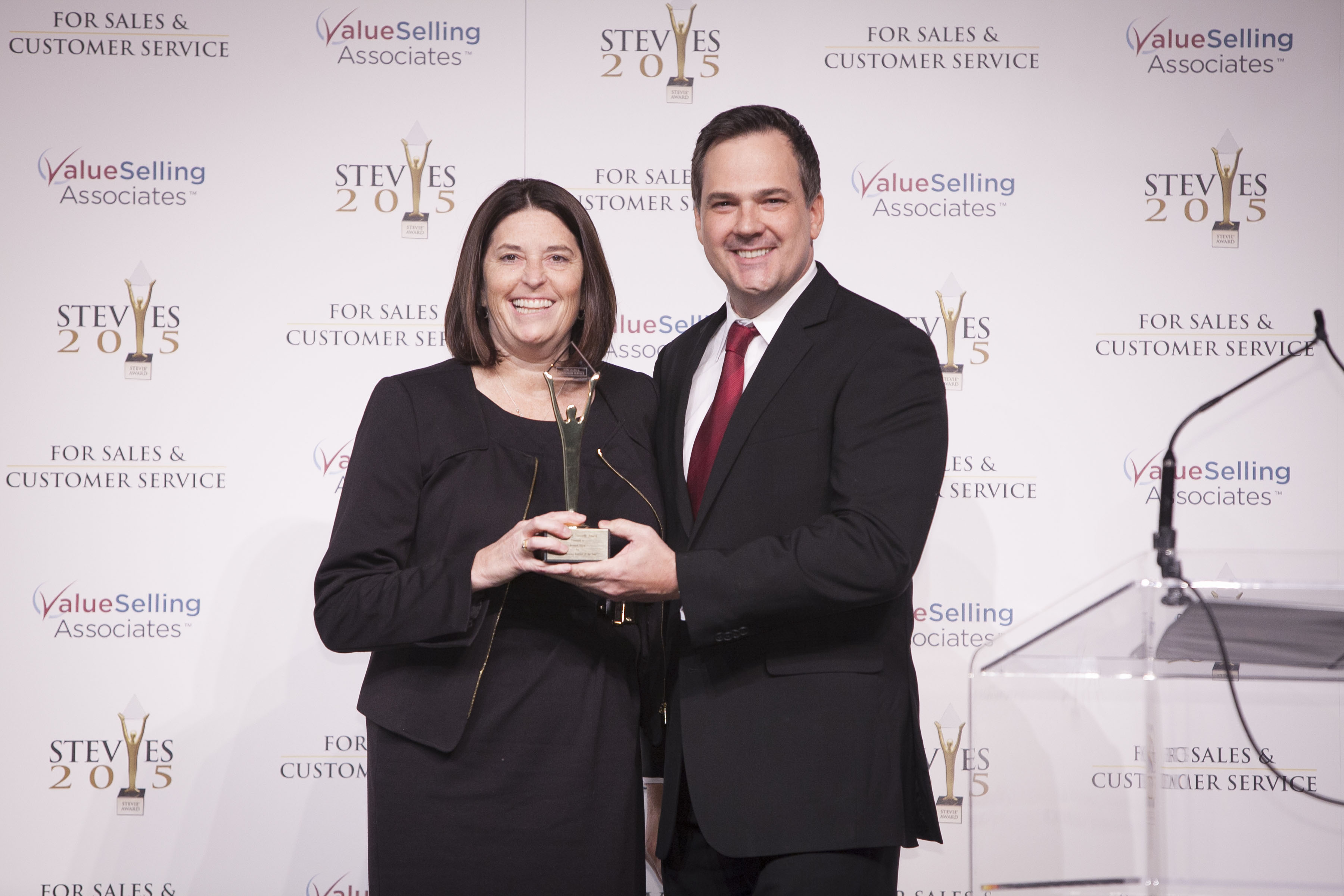 Debby Rizzo, CEO of Revenue Storm, accepts the Gold Stevie at the awards gala on February 27th in Las Vegas.