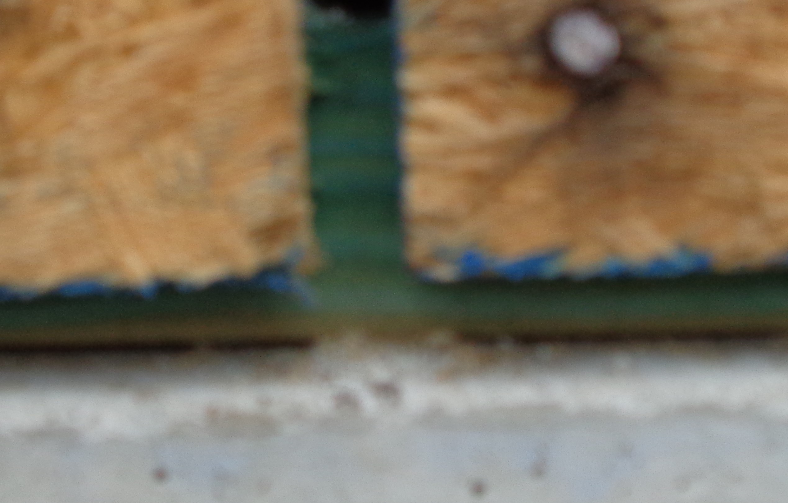 Poor sheathing installation with gaps between sheets and exposed mudsill.