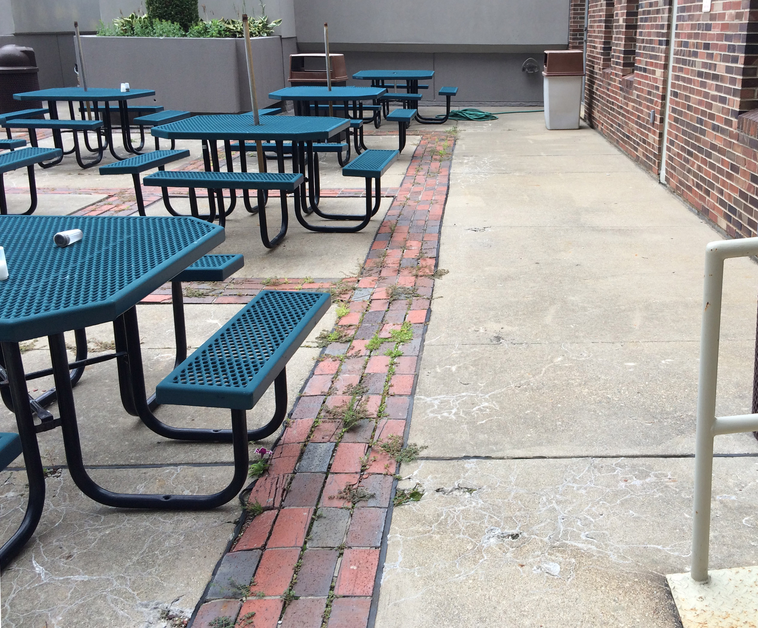 Before AZEK Pavers, the rooftop space had cracked concrete and brick.