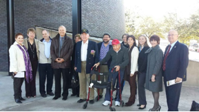 Pastor Bittner, fourth from left, with  survivor Sigmund Jucker of Three Brothers Bakery,liberators, descendants, local leaders  and staff at the Holocaust Museum