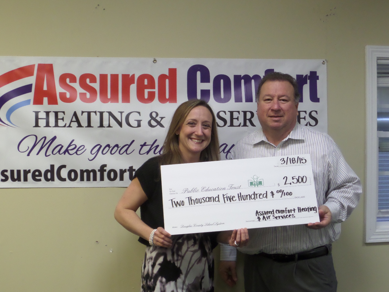 Assured Comfort owner Jerry with Lynn Cole, Chair, Education Funding Partners.