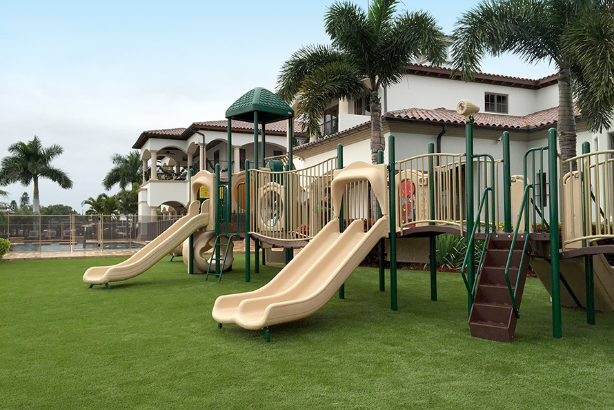 Get kids outside with a backyard playground featuring Playground Grass