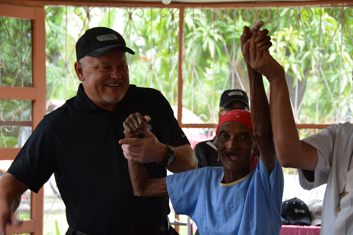 Bob Parsons Dances with 102 Year Old Haitian Woman at Foyer in Les Cayes