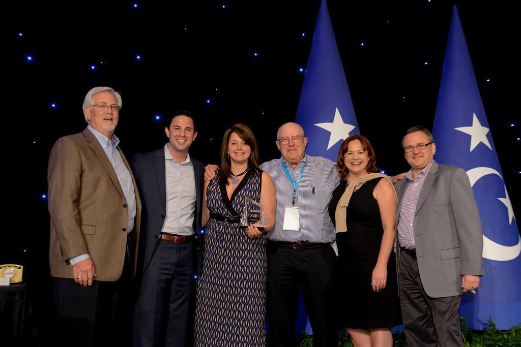 Bruce Winner, Jeremy Morton, Lisa Buckner , Beau Bradley, Christie Walters, and Jim Payne accepting President's Award as top independent dealer.