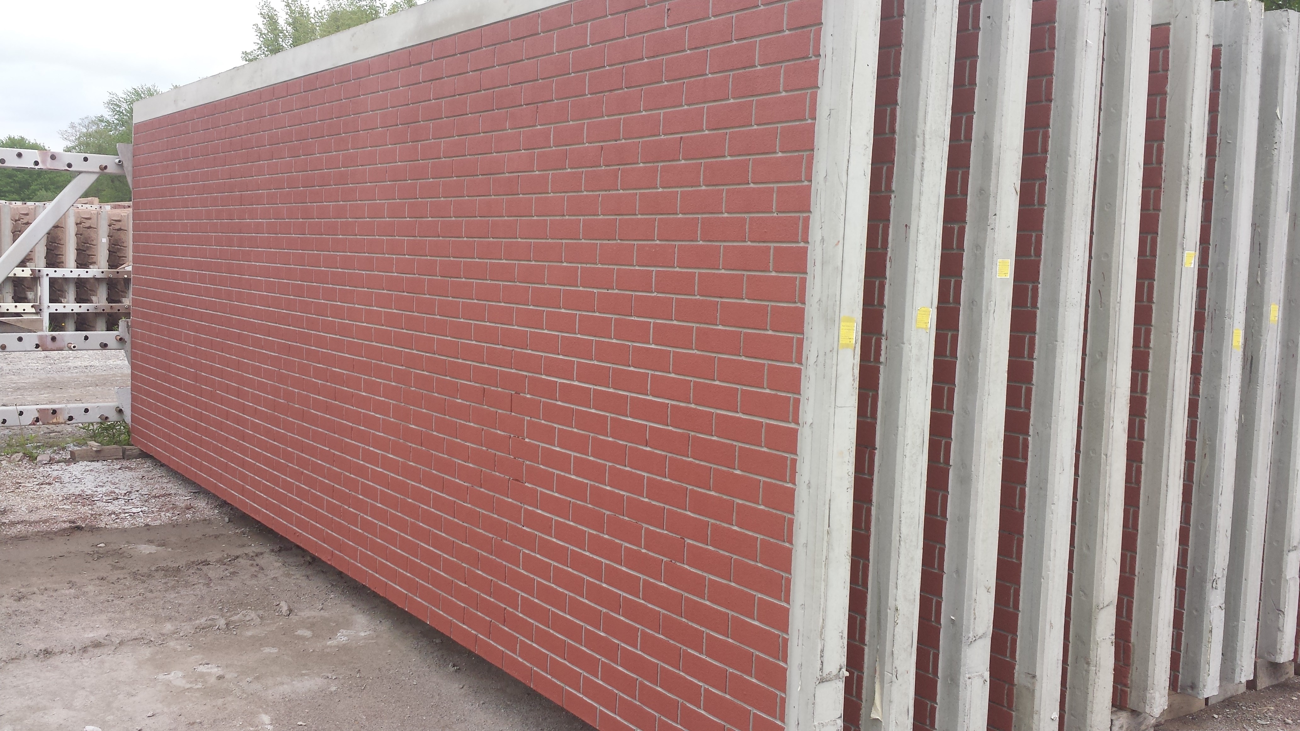 Stamped brick exterior: Such sound walls are often exposed to harsh environmental conditions dividing interstates and communities. PENETRON ADMIX’s crystalline technology protects the walls from salt