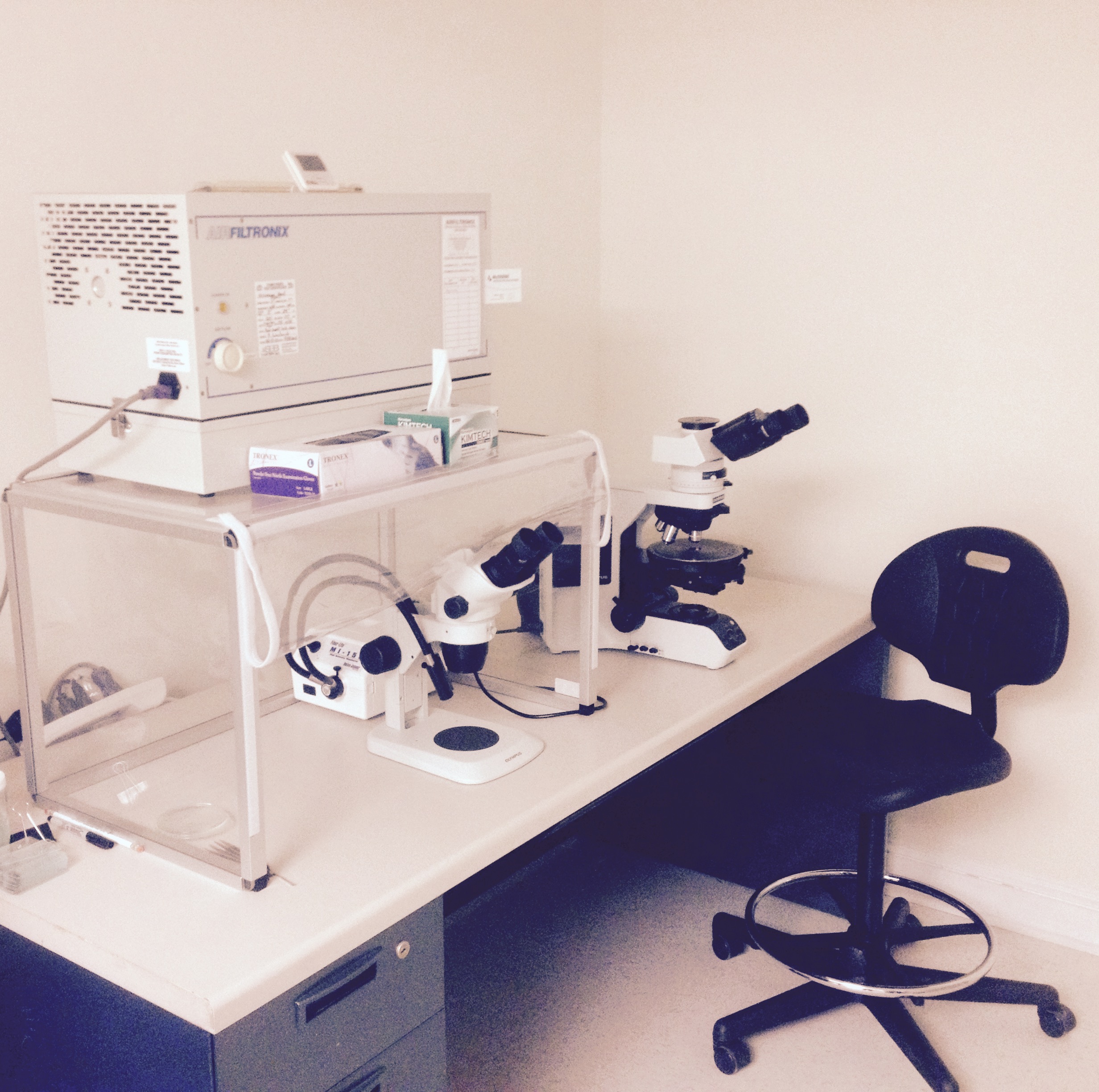 Polarized light microscopy laboratory station at Northeast Laboratory Services, Inc.