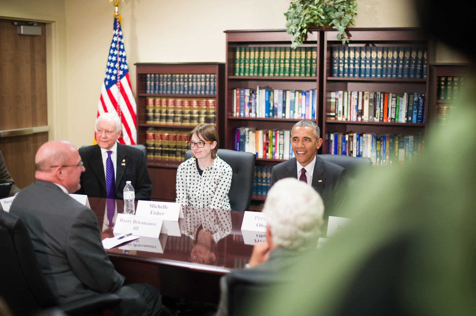 SLCC energy management student and Air Force veteran Michelle Fisher, seated next to Utah Sen. Orrin Hatch, meets with President Barack Obama during his first visit to Utah. (Photo: Dave Newkirk)