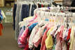 Children's clothing from Uptown Tots fills a rack at Clickstop Cares in Urbana.