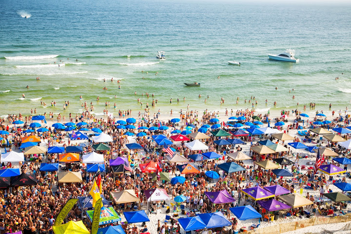 Tens of thousands will flock to the beach for the 2015 Flora-Bama Interstate Mullet Toss
