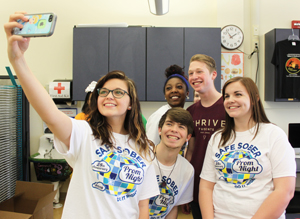 High school students take selfie at SSPN pledge signing