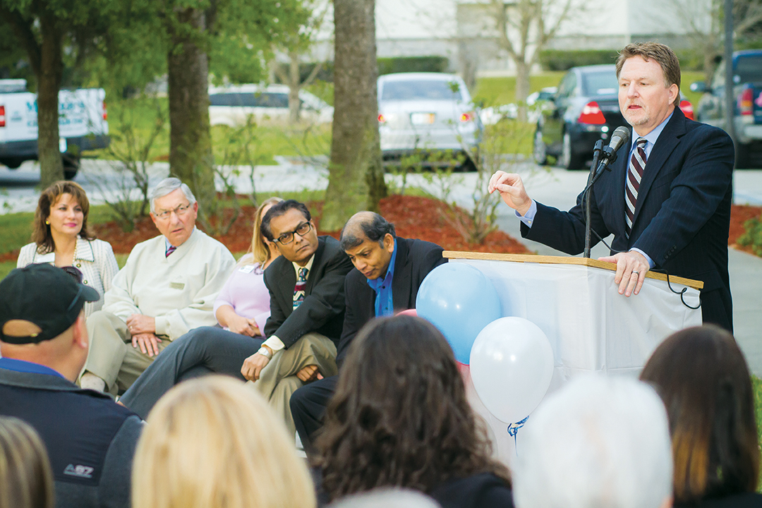 Bradley A. Prechtl, CEO of Florida Cancer Specialists, speaks at a ribbon-cutting ceremony on March 27, 2014 to introduce the community to the newly expanded office space in Sebring, FL.