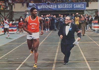 Houston McTear (left) running for the Muhammad Ali Track Club (1976)