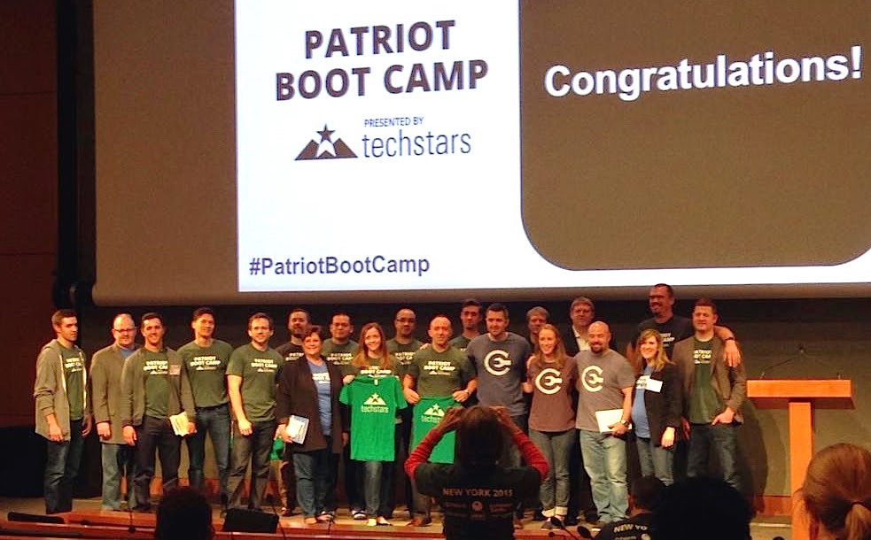 The CauseEngine team on stage with the other participants following the pitch competition.