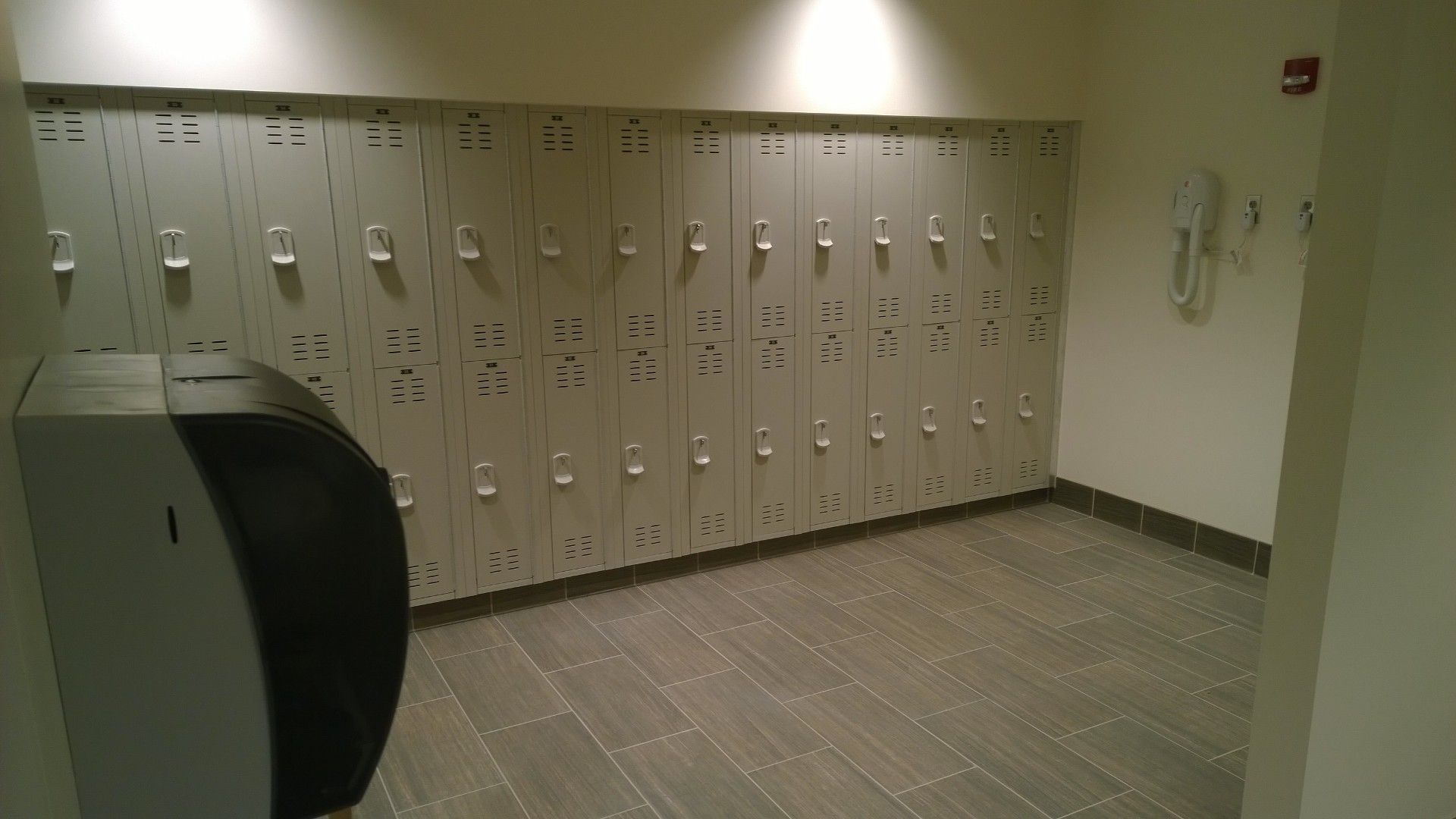 Tufftec Lockers in a matching color to the partitions contributed to the clean, modern design.