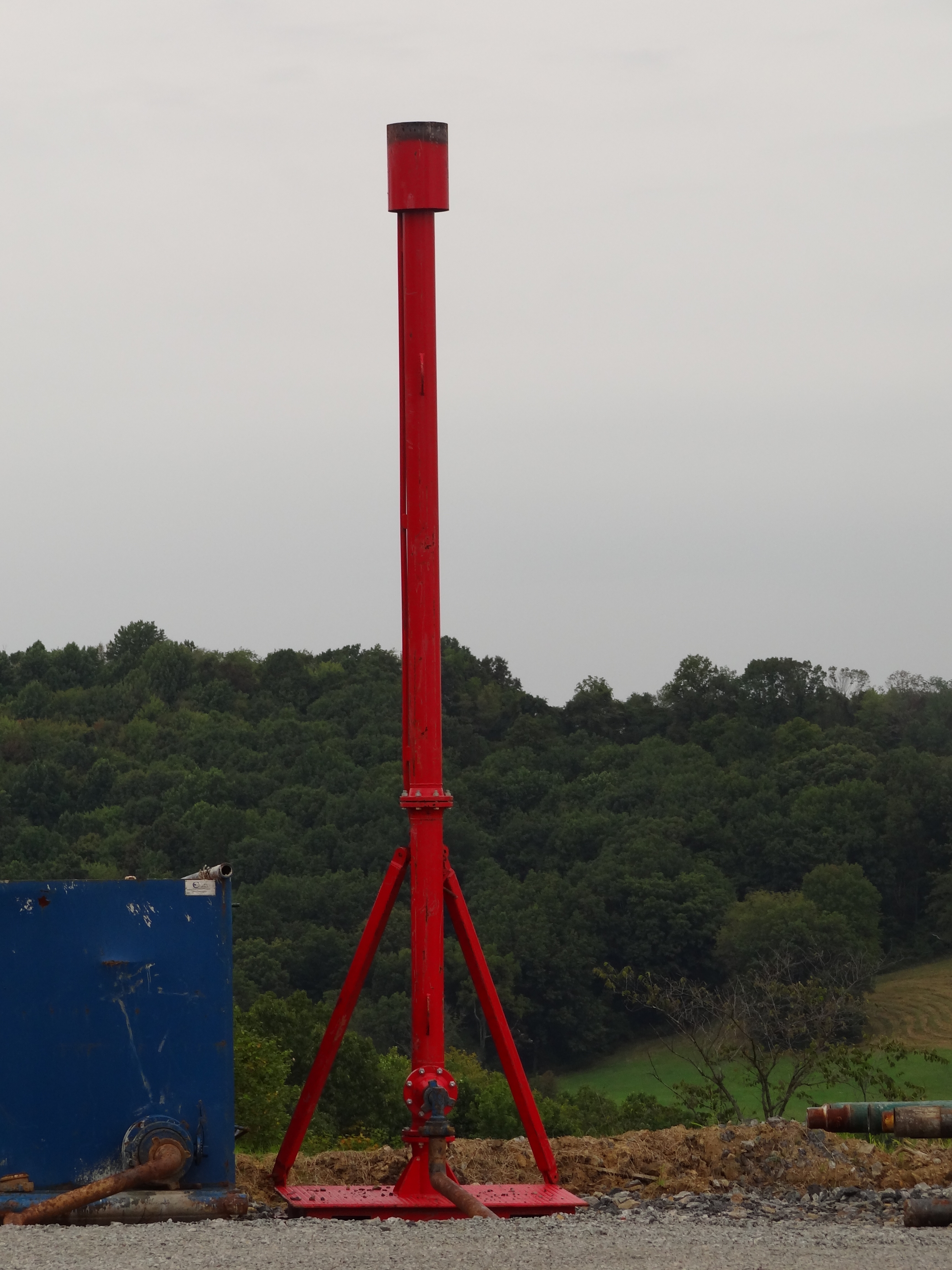 A flare stack to burn excess natural gas at a natural gas drill site in the Marcellus Shale gas play of western Pennsylvania. During drilling, gas may be encountered that needs to be safely burned to