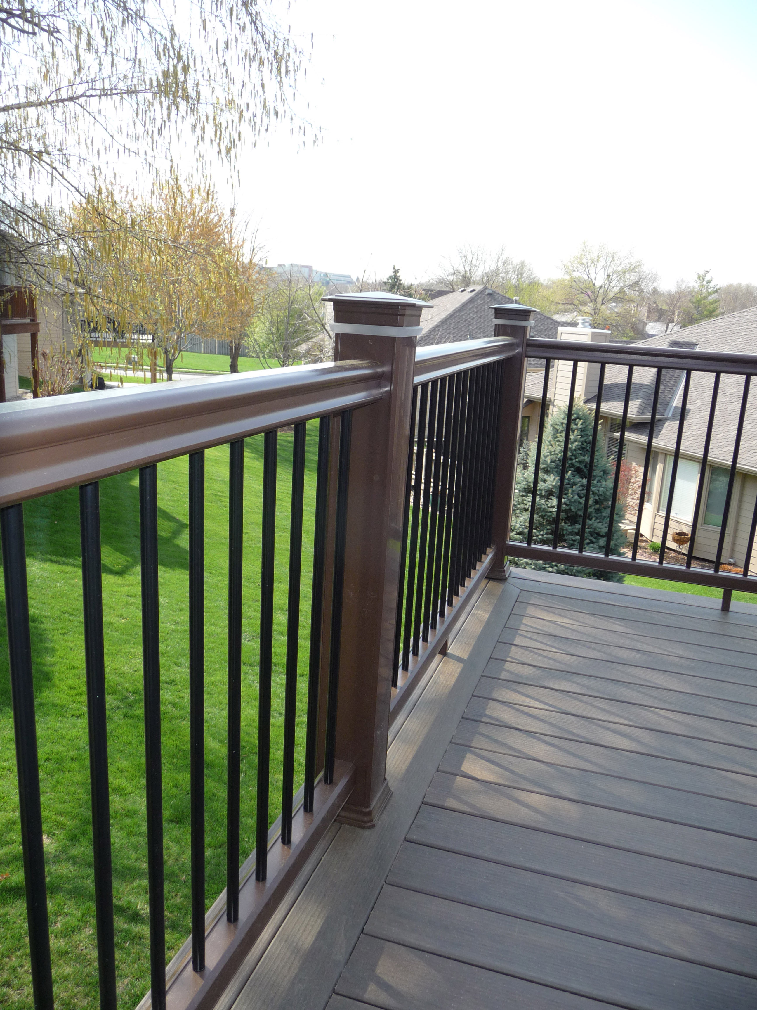 TimberTech capped composite decking and railing also feature post cap lighting to  extend outdoor fun into the evening.