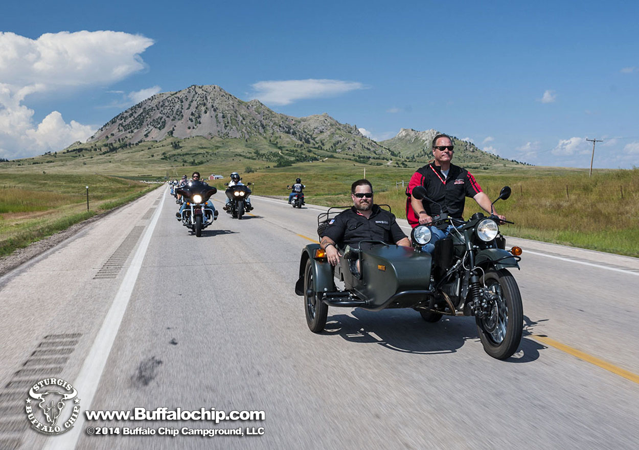 Riders participate in the 2014 Sturgis Buffalo Chip's Freedom Ride as part of the annual Freedom Celebration to honor America's veterans.