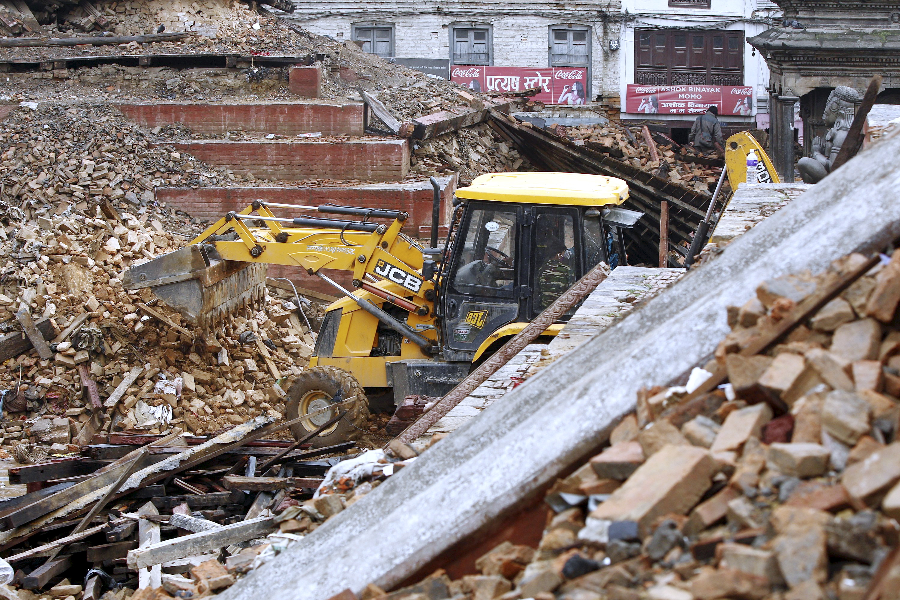 A JCB backhoe works at the earthquake disaster area in Kathmandu, Nepal.