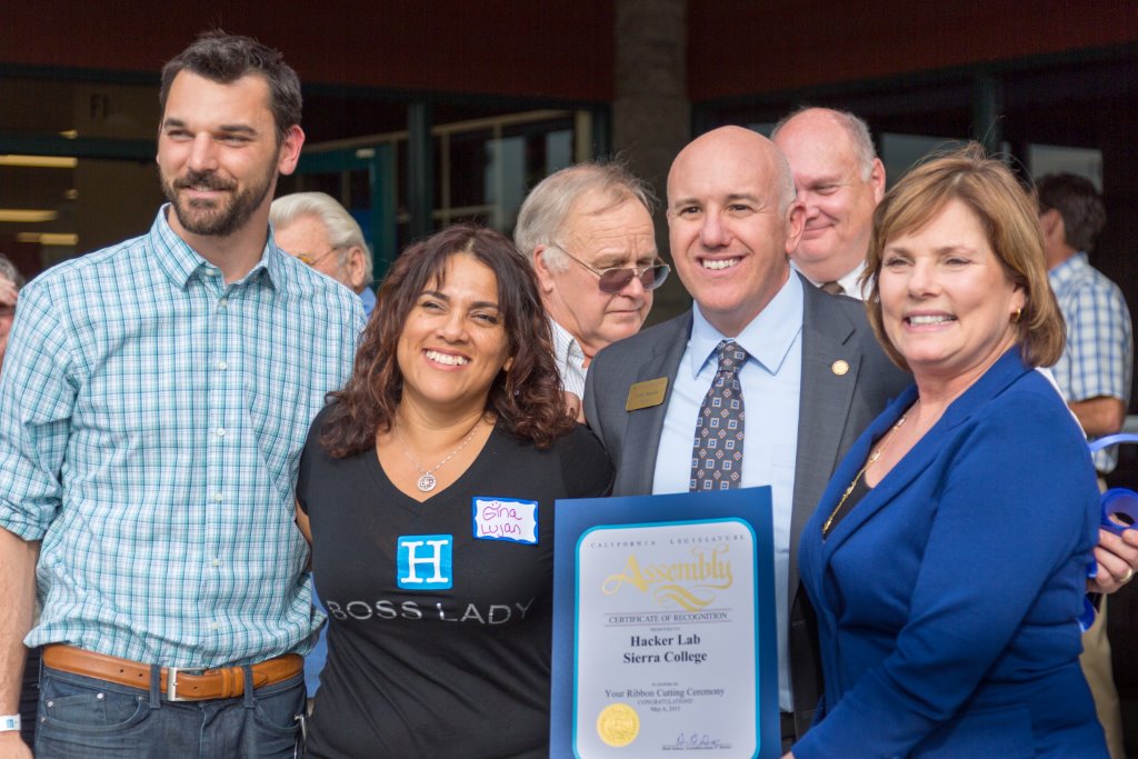 Assemblymember Beth Gaines (right) presents proclamation to Hacker Lab and Sierra College with (L to R) Eric Ullrich, Co-founder, Hacker Lab; Gina Lujan, Co-founder, Hacker Lab; George Magnuson, Mayor