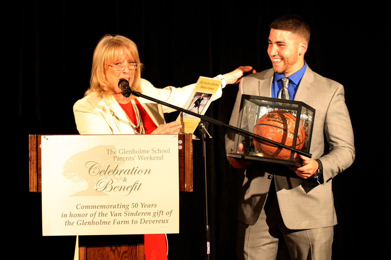 Maryann Campbell, Executive Director of The Glenholme School, honored Michael Cipriani with the Teacher of the Year award during the school’s annual Parents’ Weekend Celebration and Benefit.
