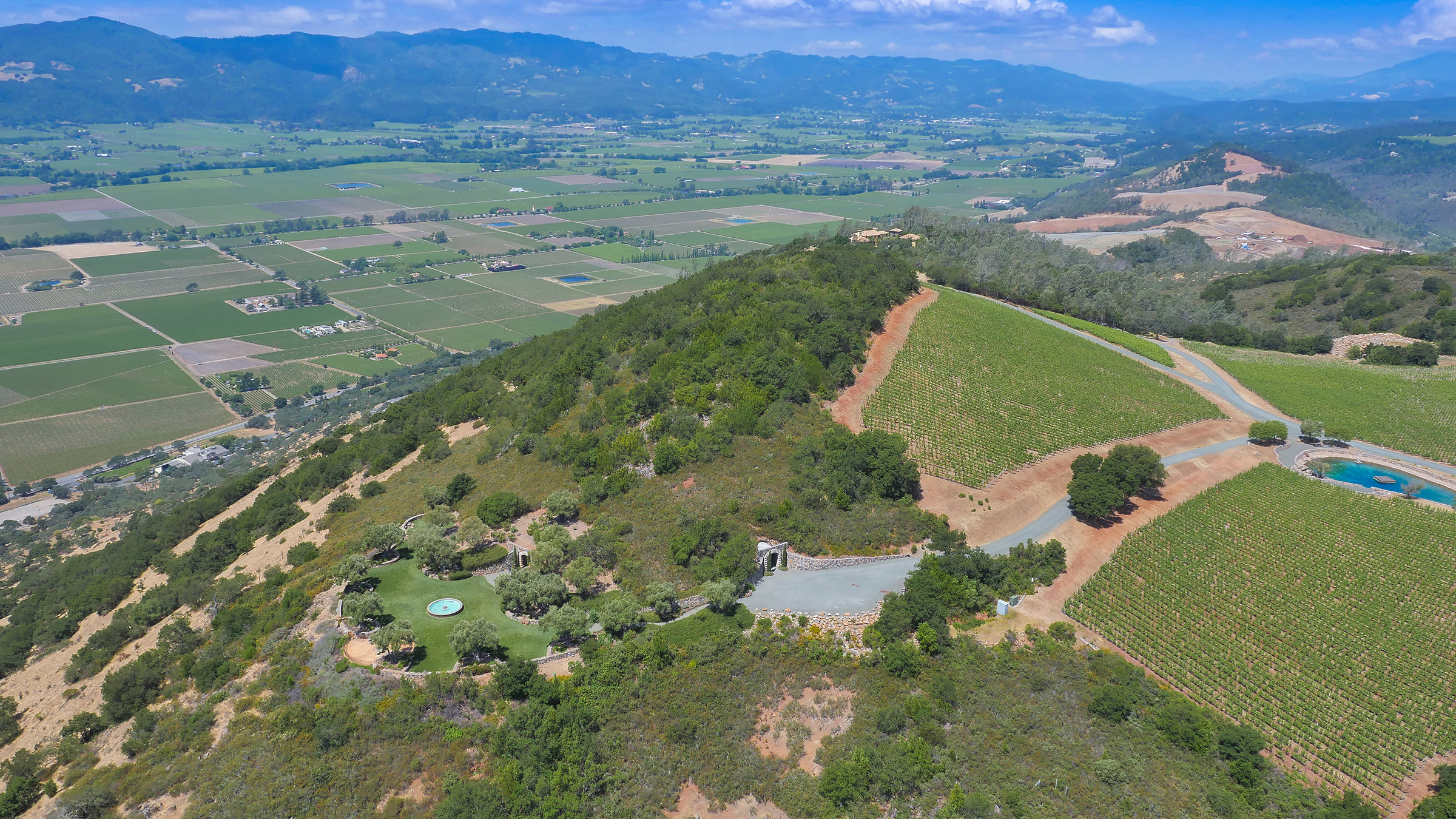 Existing hospitality area and two of the entrances to the 20,600 feet of caves for winemaking and hospitality.