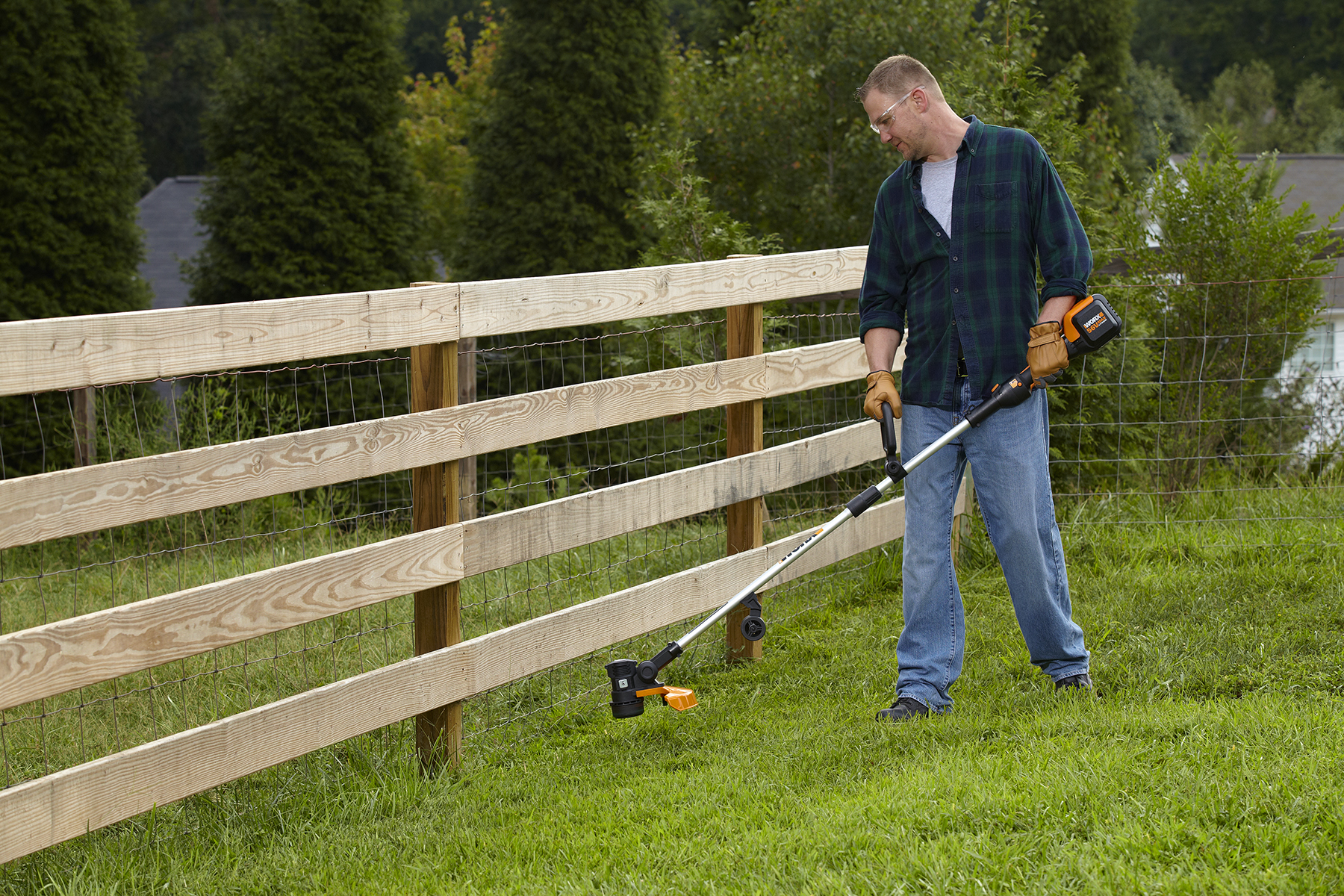 WORX 56V Trimmer/Edger easily trims in hard-to-reach areas.