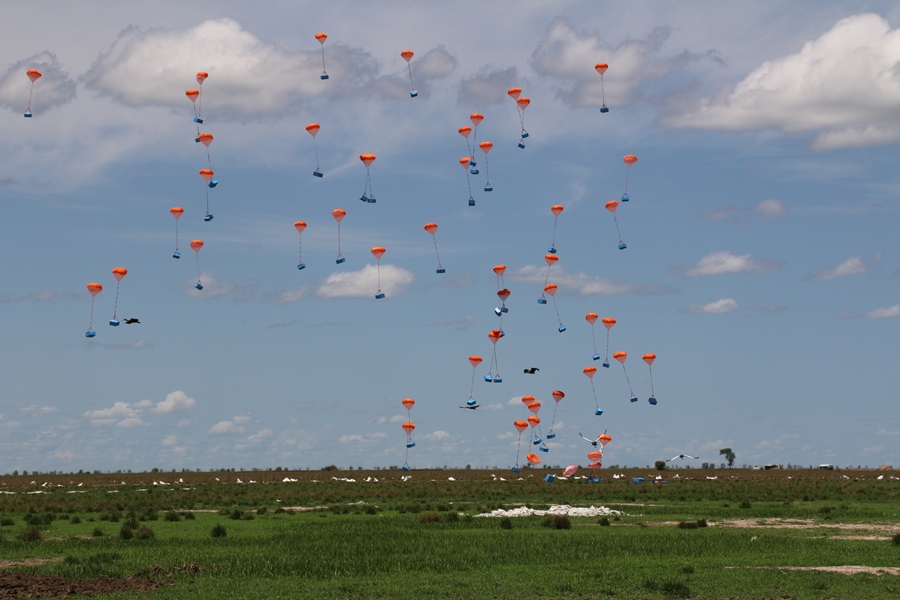 Jugs of Oil Float to the Ground in Ganyiel, South Sudan