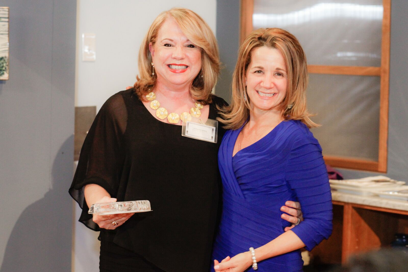 Winning designer Rosemary Porto with Clarke's Debra Burke at "An Evening to Remember" awards.
