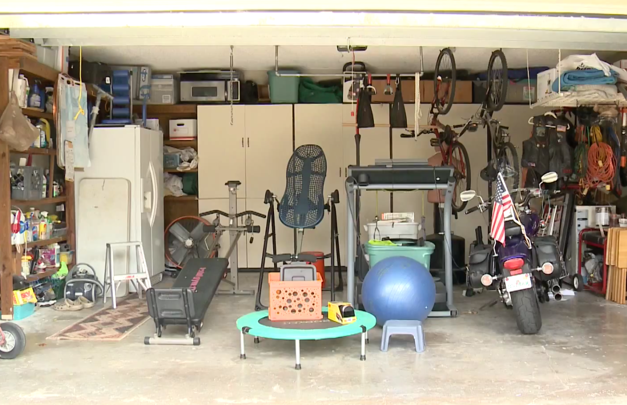 This doctor's garage was a mess before a crew from Flow Wall stepped in to organize the clutter.