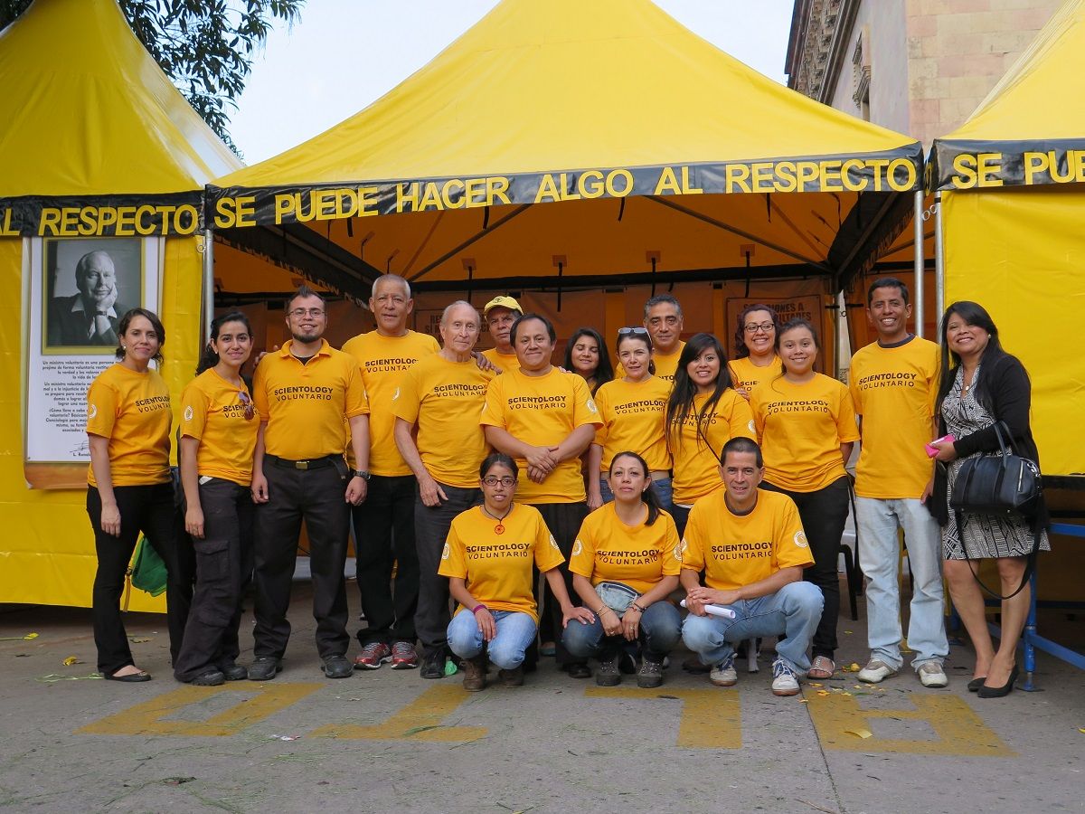 Local Volunteer Ministers led by a team from the Latin American headquarters in Mexico City are providing one-on-one help, workshops and courses at the bright yellow tent.