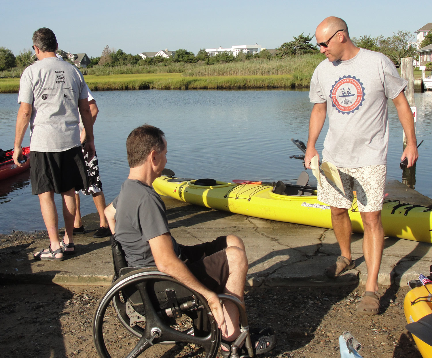 Alex Rohman, right, and George Taborsky, in chair, are directors of the annual Coastal Team Challenge from World T.E.A.M. Sports along the coast of Long Island, New York. Photograph courtesy Alex Rohm