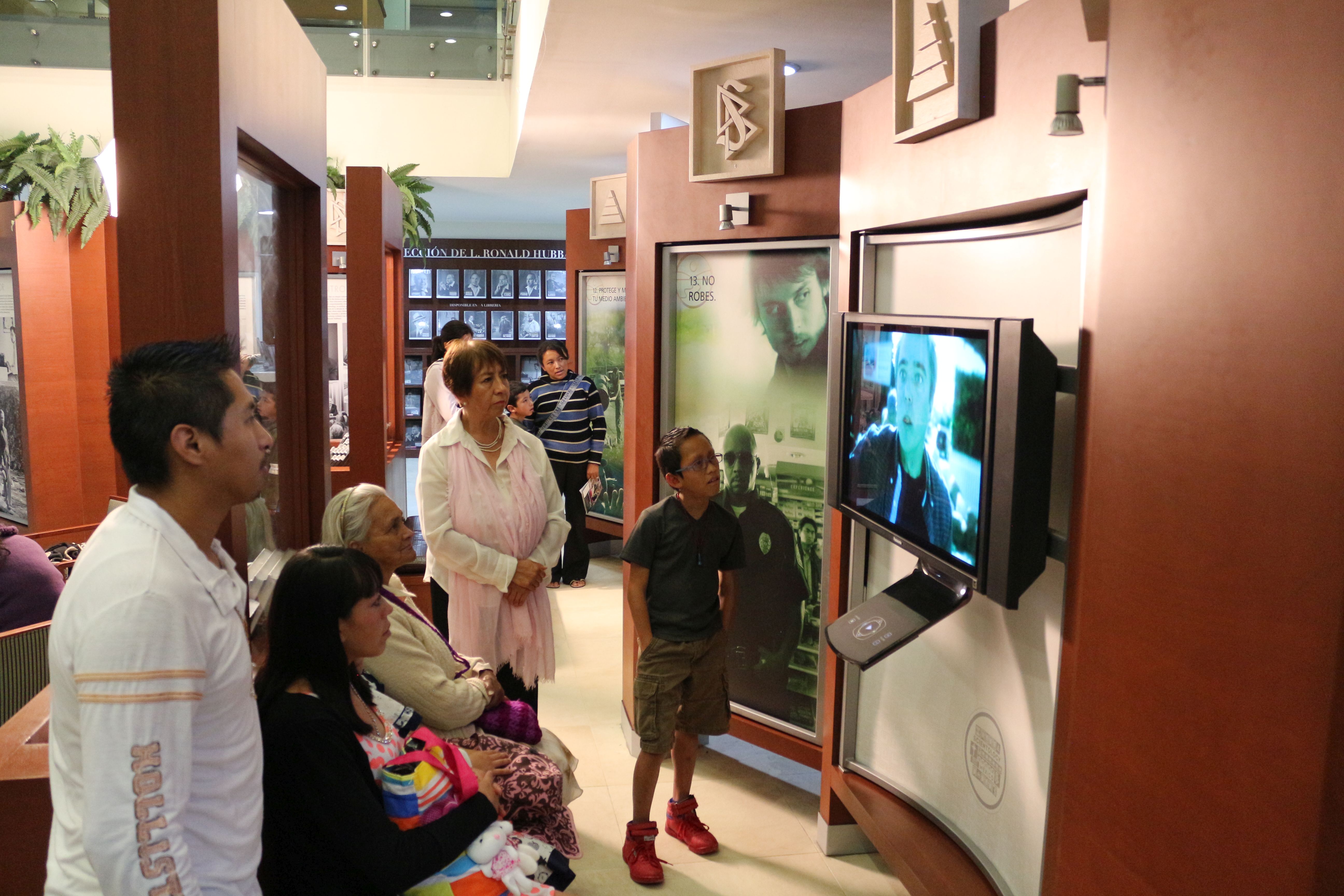 Guests visit the Public Information Center at the World Environment Day Open House at the Church of Scientology of Mexico.