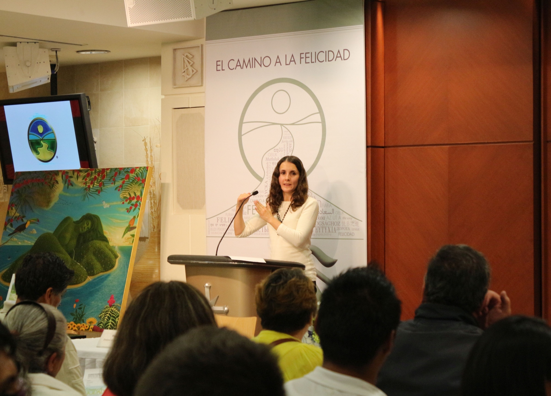 Social Reform Officer of the Church of Scientology of Mexico  welcomes guests to World Environment Day celebration.