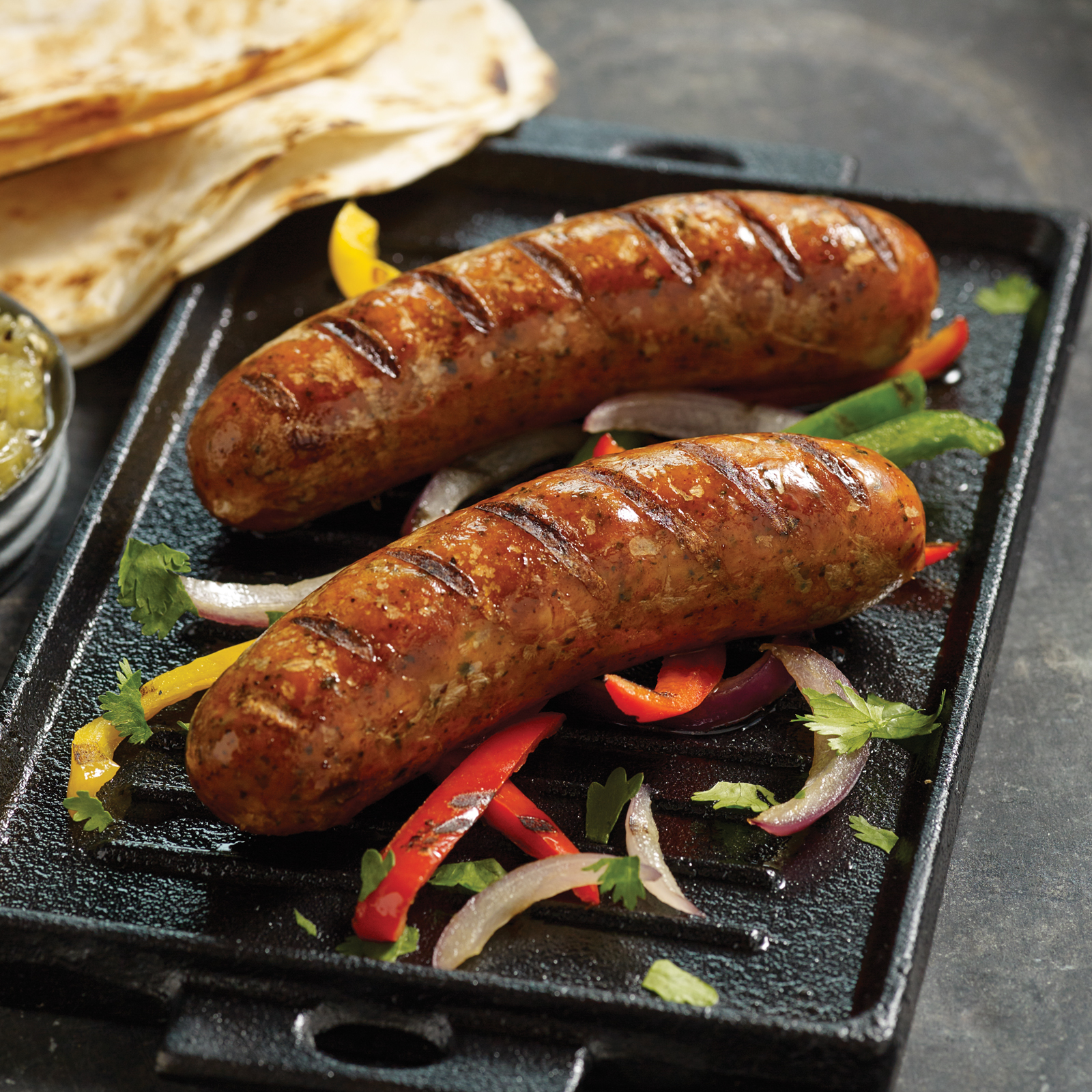 Spice up your next barbeque with Omaha Steaks super-juicy Chicken Chipotle Sausages!
