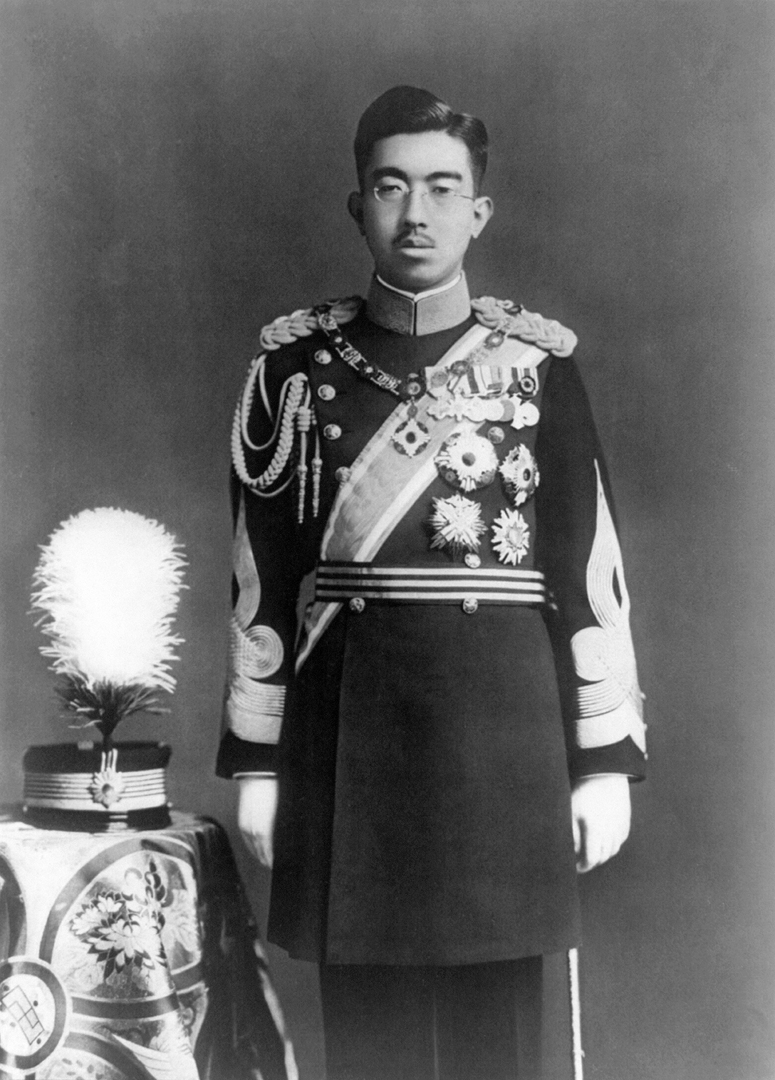 Emperor Hirohito of Japan, in full dress uniform in 1935. Ten years later, he would be the only authority capable of overruling militarist opposition to the surrender of his defeated empire. LIBRARY O