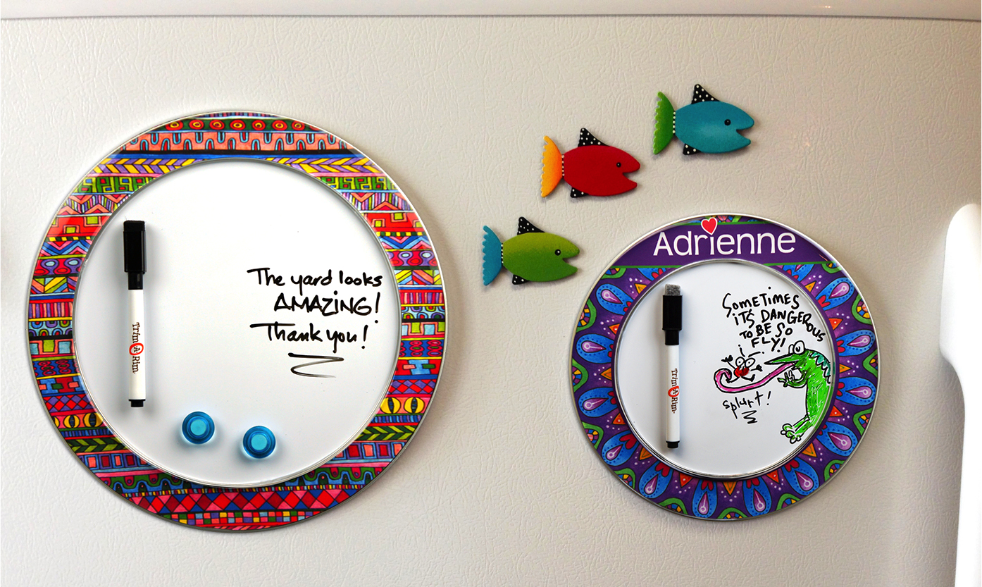 Full size and Mini Trim-A-Rims with Hello Angel border designs on the family fridge. (Looks like Adrienne got creative on her whiteboard as well.)