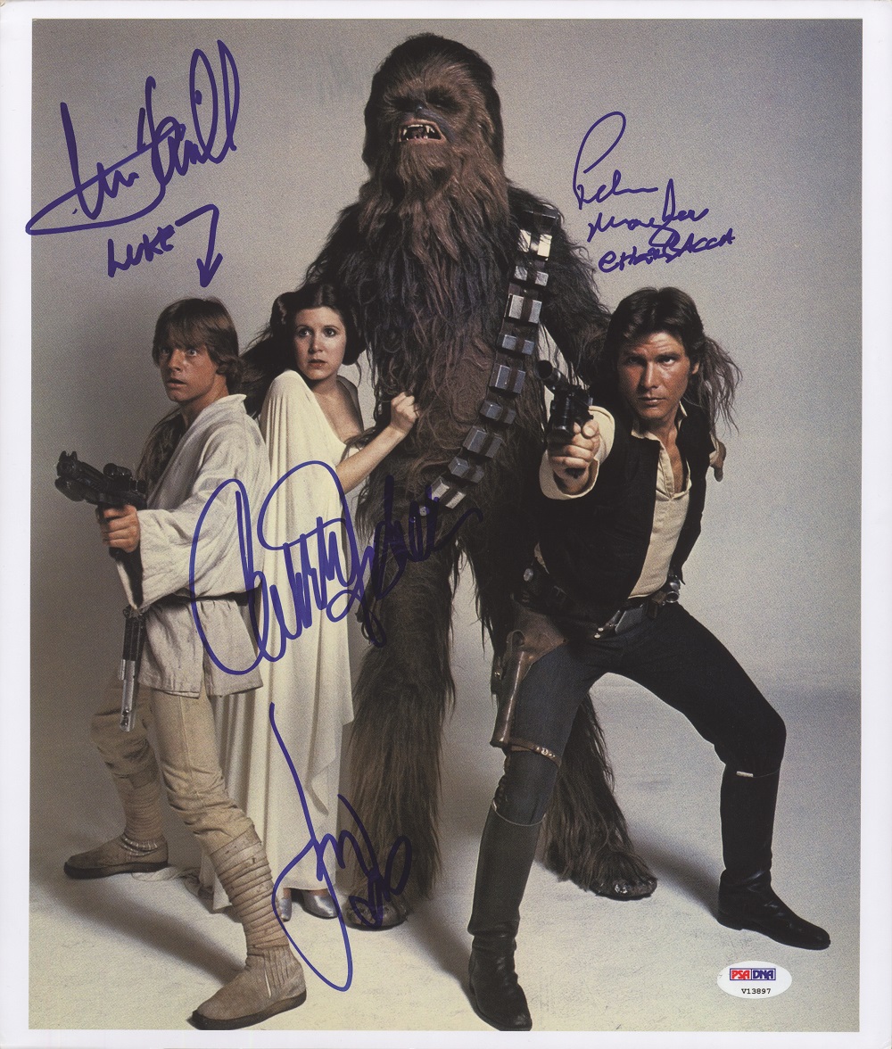 PSA will give away to a lucky San Diego ComicCon visitor a Star Wars 1977 cast photo autographed by stars Harrison Ford, Carrie Fisher, Mark Hamill and Peter Mayhew valued at $1,000.