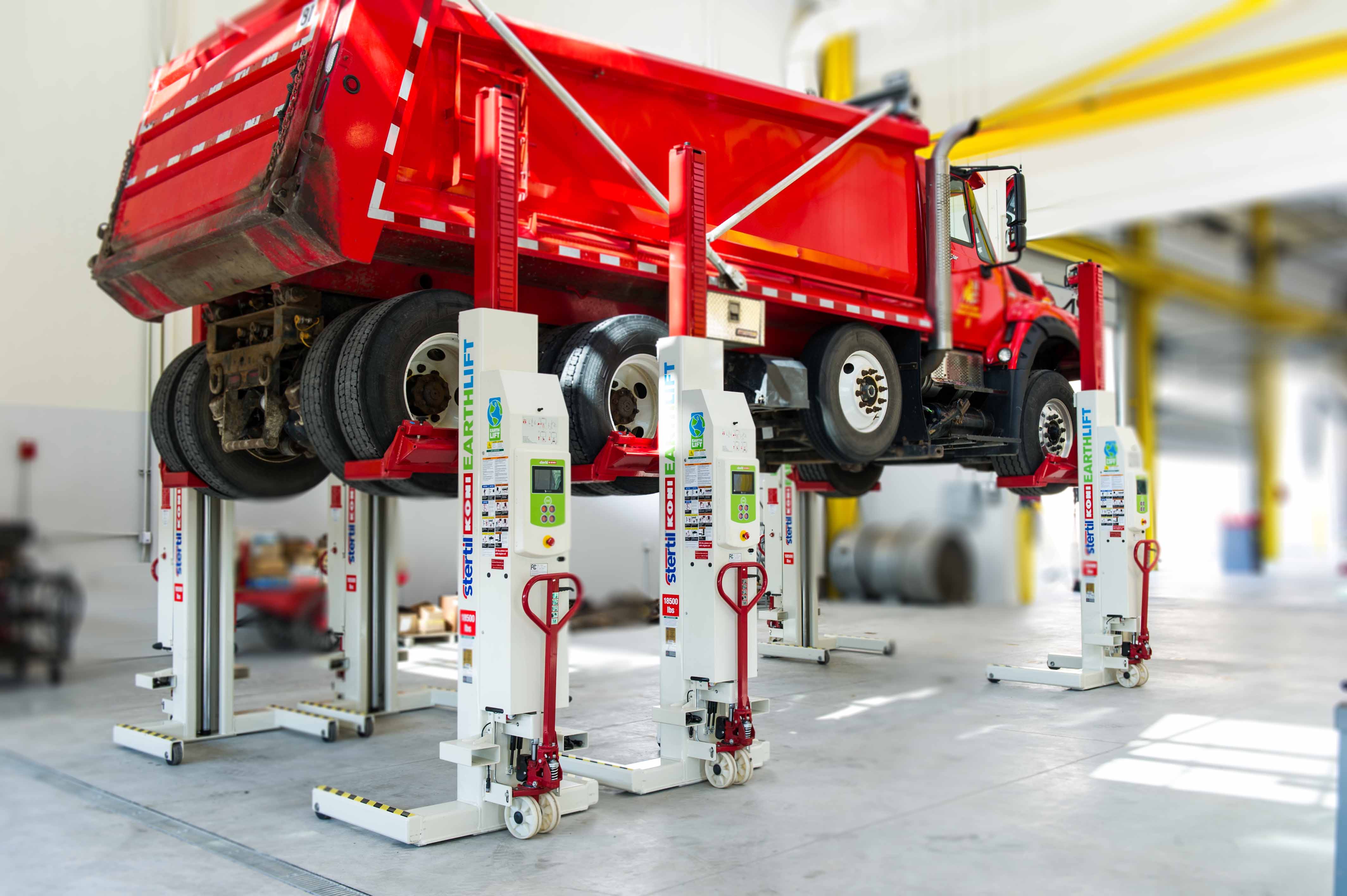 Wireless mobile column lifts eliminate tripping hazards and can be quickly moved around the shop floor.
