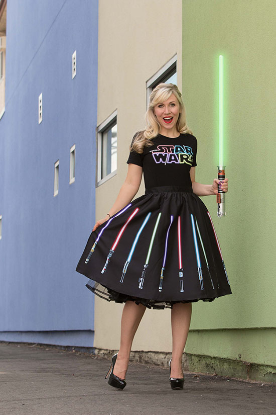 Already an Internet sensation, the Force is definitely with this popular Her Universe lightsaber skirt and shirt which will be available at D23.